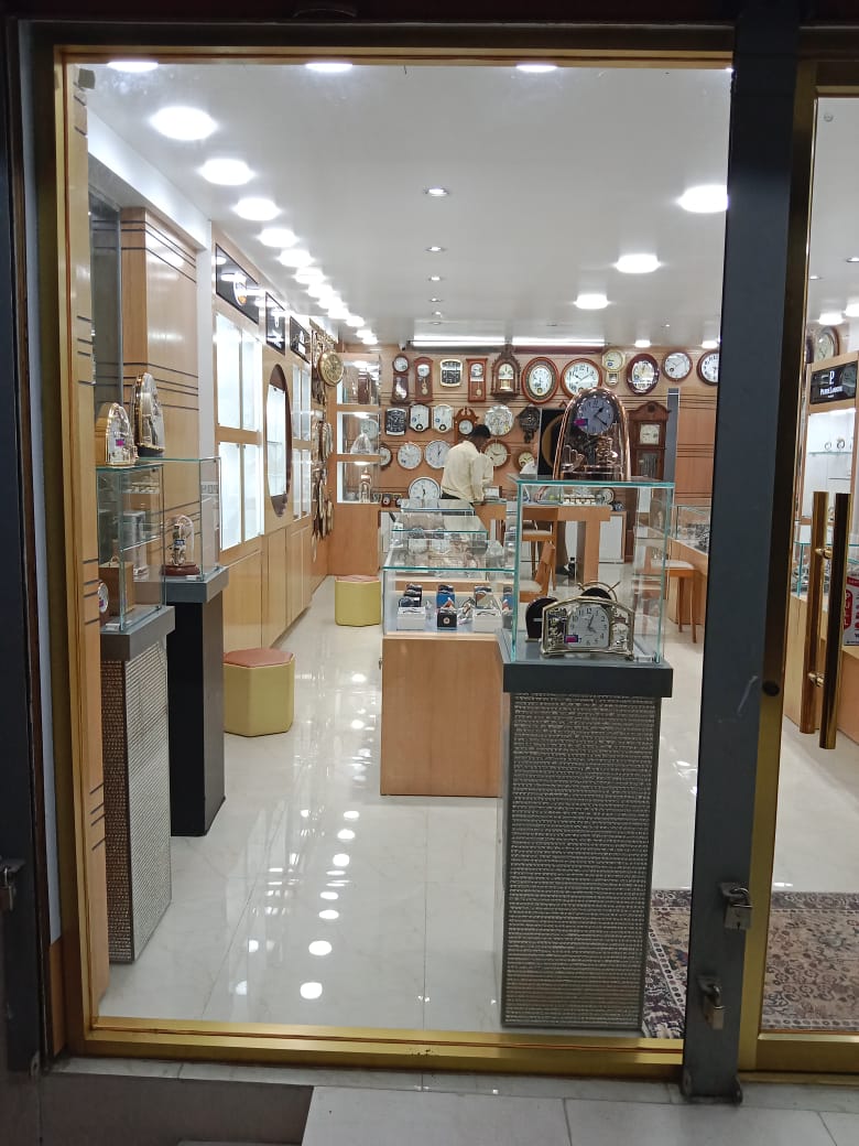 A watch movement being assembled by a watchmaker.